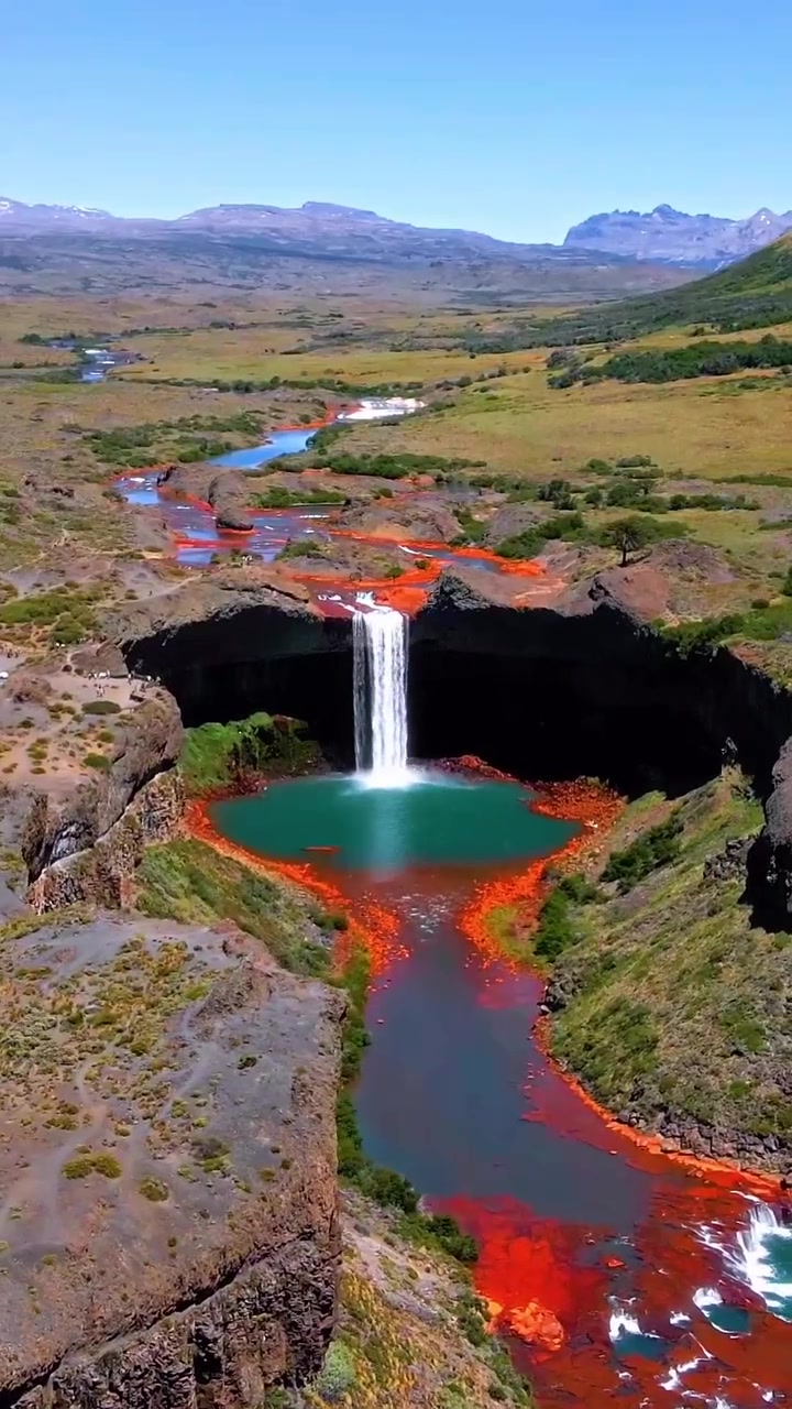 Aerial View of Waterfall with Turquoise Pool