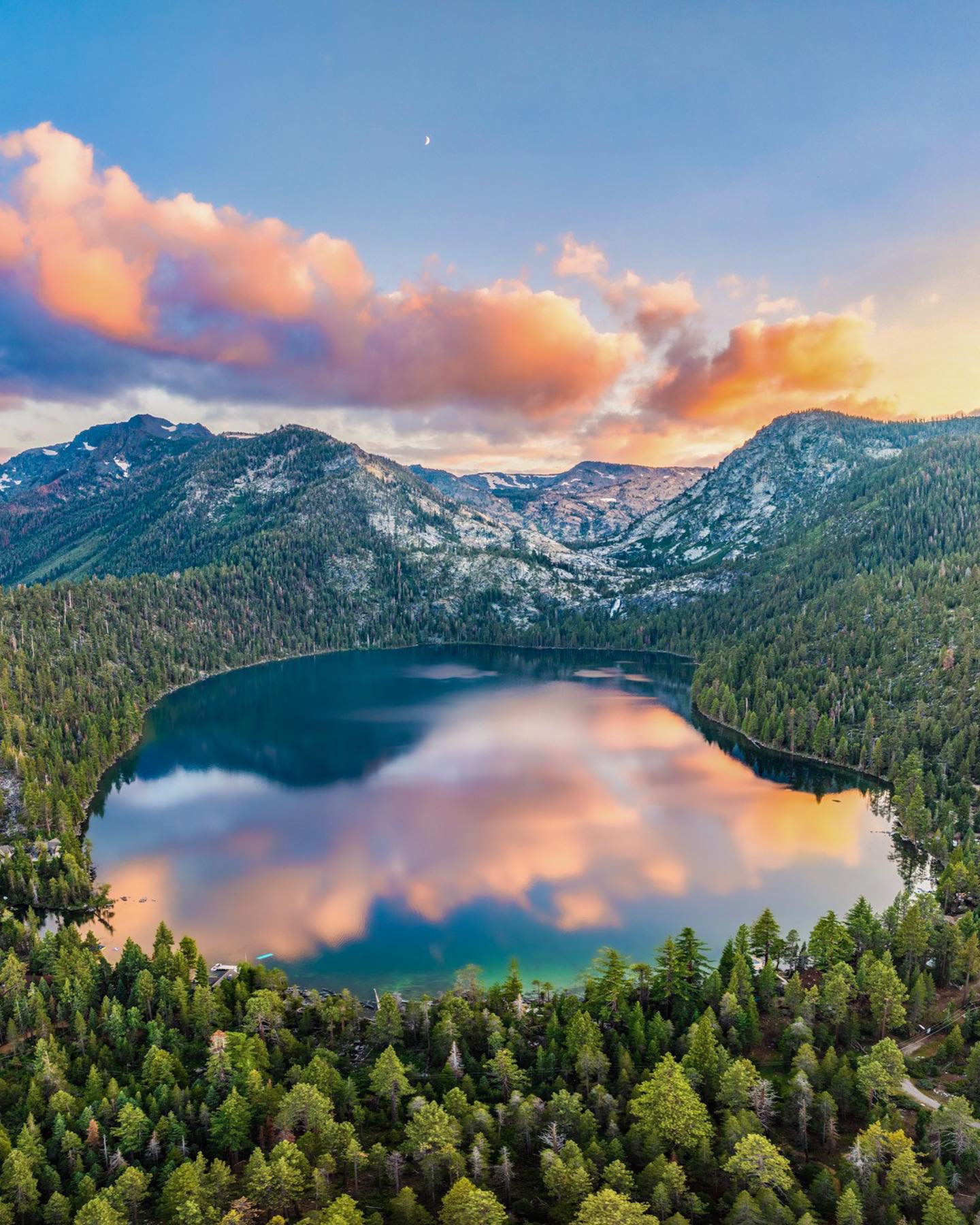 Aerial Views of Lake Surrounded by Mountains