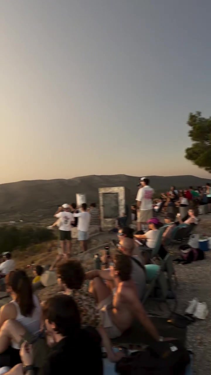 ### Witnessing the Solar Eclipse: A Hilltop Gathering in Spain