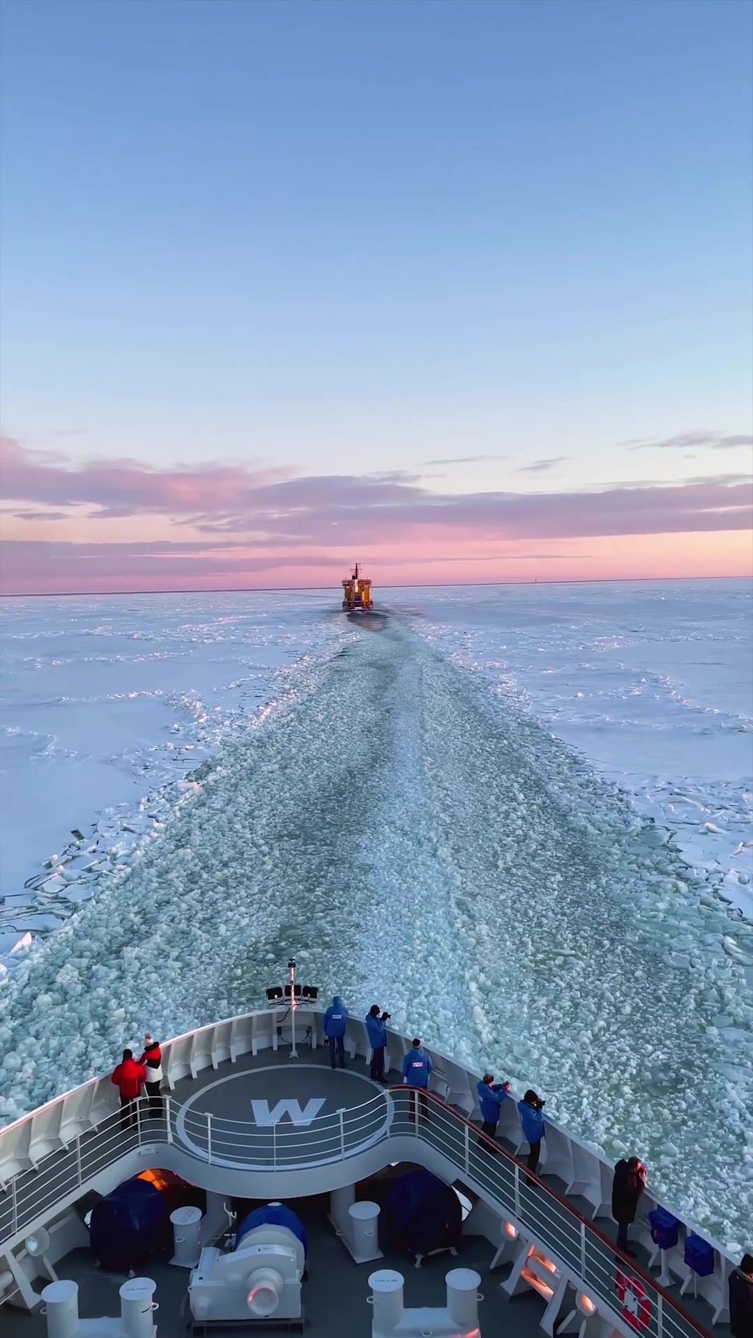 Icebreaker Ship Sunset: Lake Voyage at Dusk