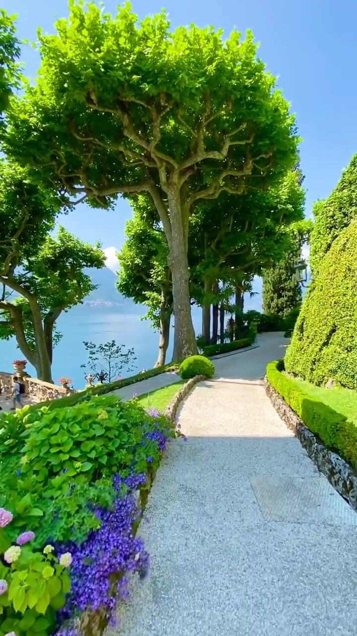 Scenic Garden Path: Lake and Mountain Views