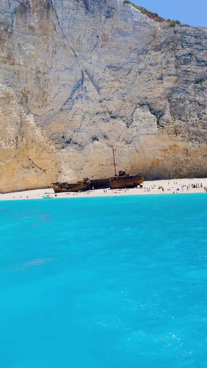 Turquoise Beach with Shipwreck: Scenic Travel Destination