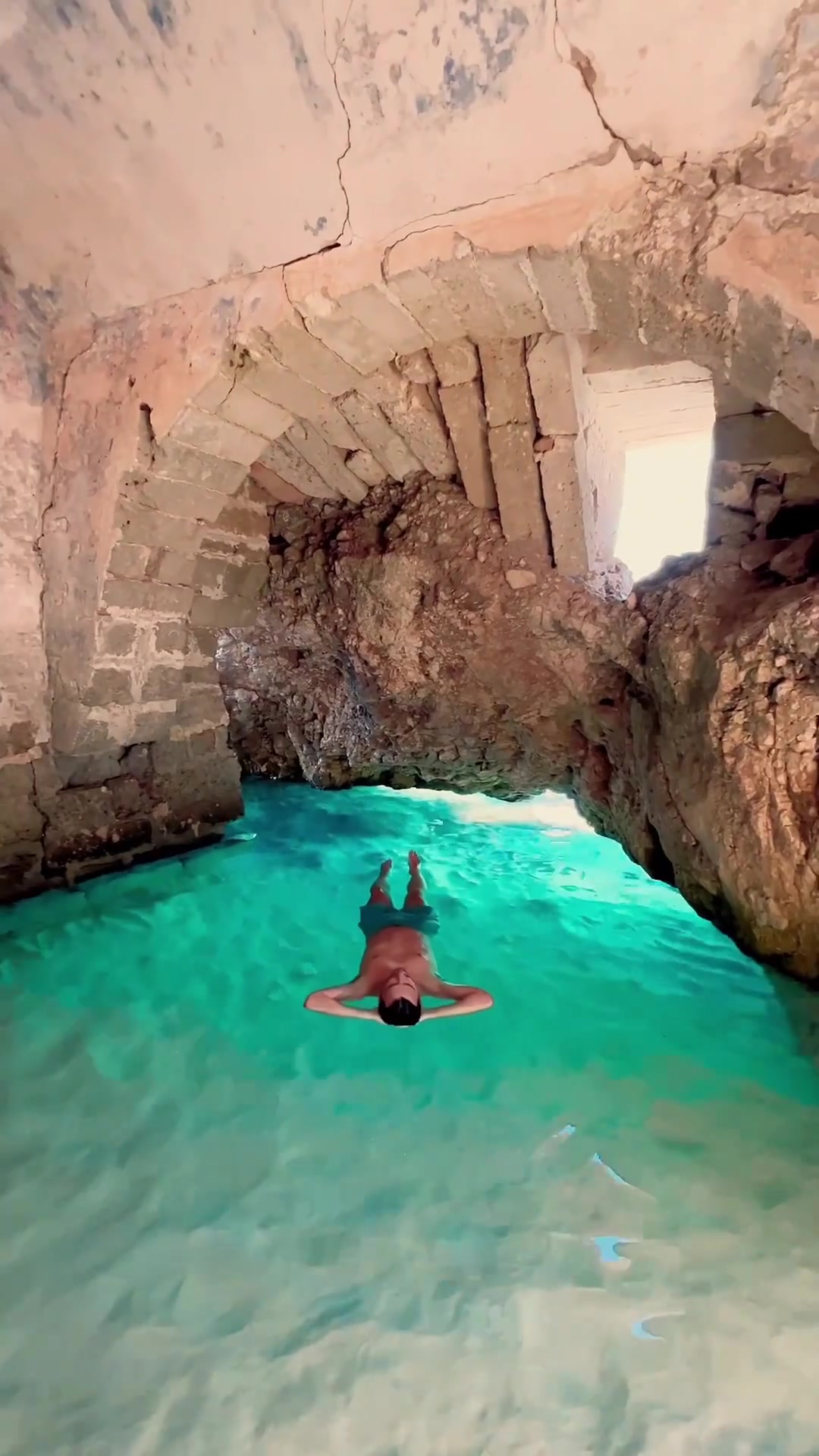 Swimming in a Cave Pool: Dramatic Scenery