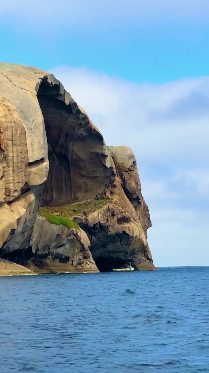 Coastal Rock Formation: Ocean Face Sculpted by Erosion