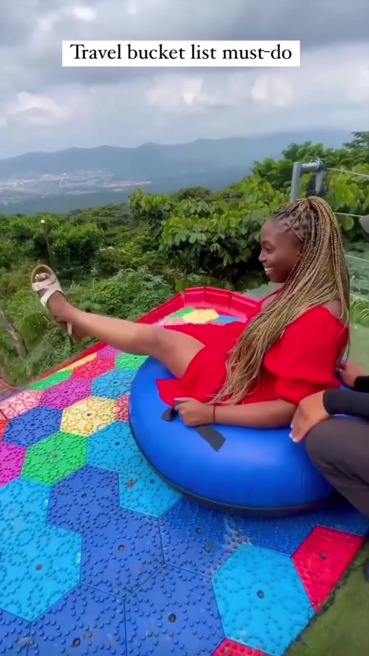 Ride Giant Rainbow Slide in El Salvador