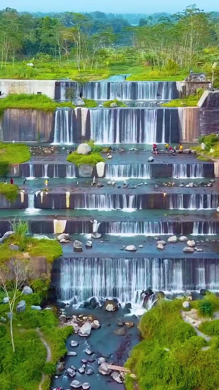 Multi-Tiered Waterfall: Panoramic View and Visitors