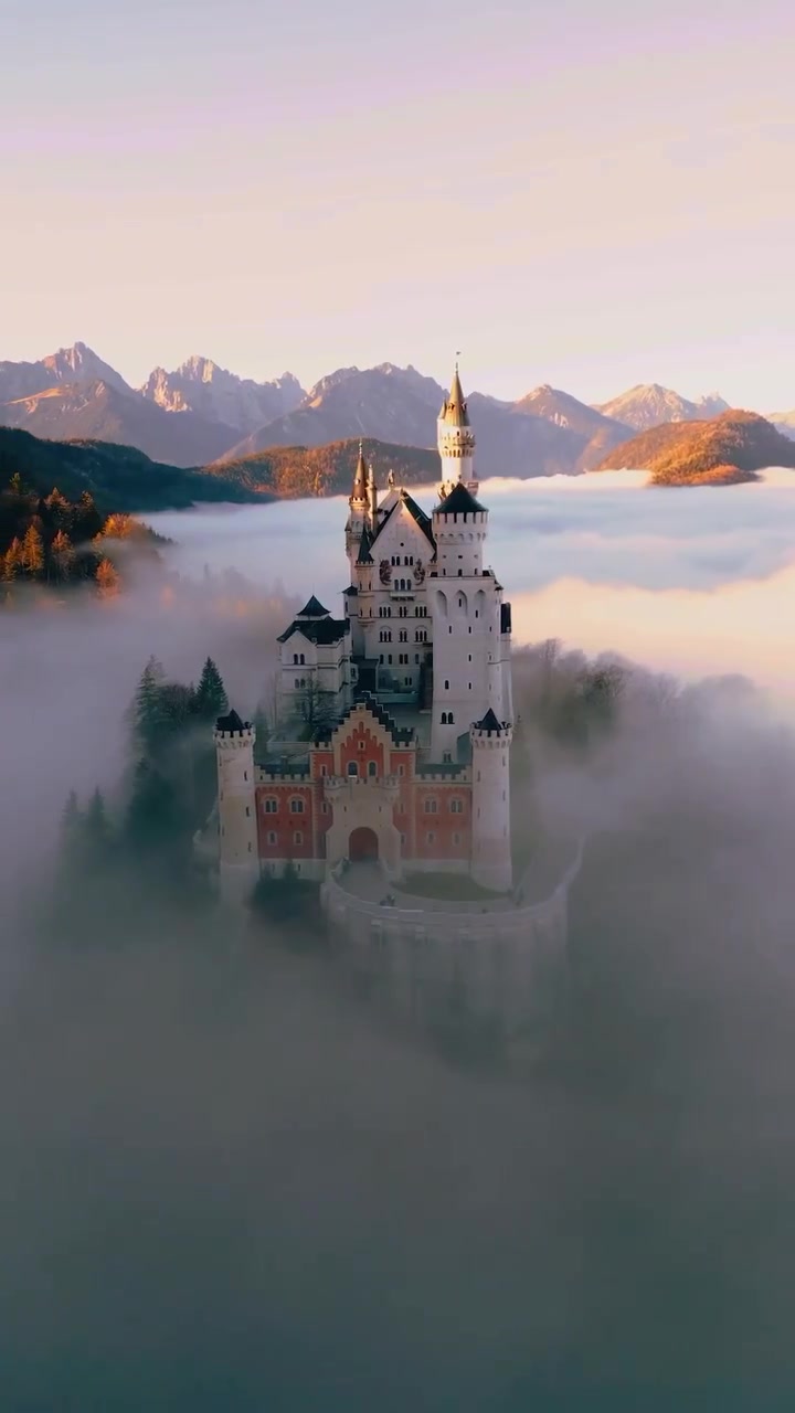 Neuschwanstein Castle: Aerial View in Misty Bavaria