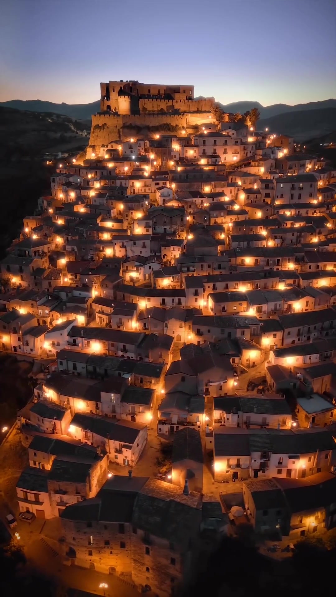 Rocca Imperiale: Aerial View of Lit-Up Italian Village
