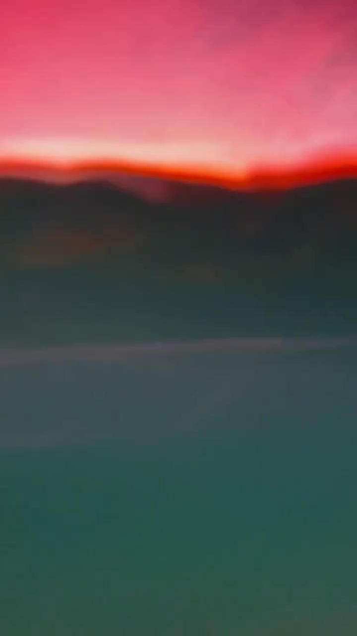 Sunset Over Water: Time-Lapse of Sky's Colors