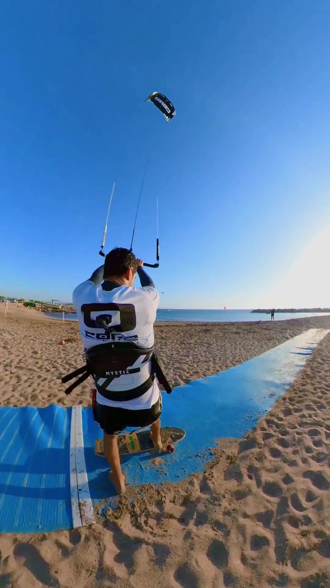 Mystic Kiteboarding Action in Sunny Outdoor Setting
