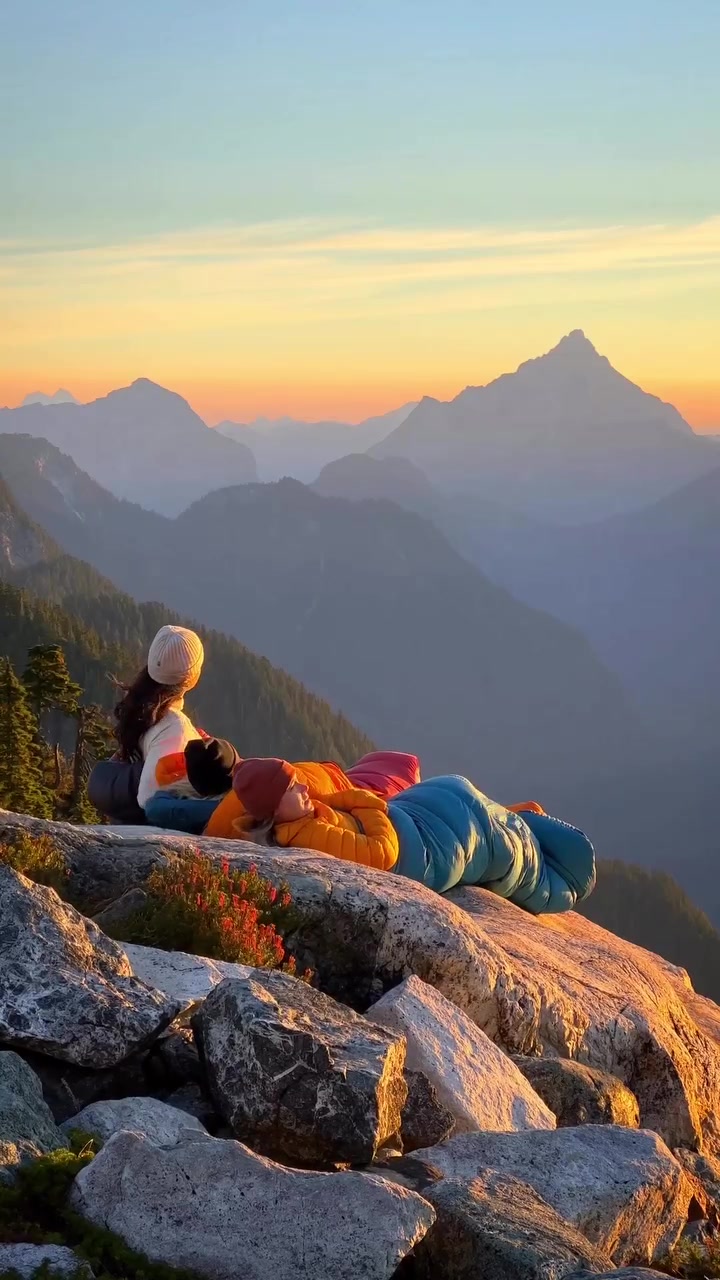 Mountain Sunrise Camping with Sleeping Bags
