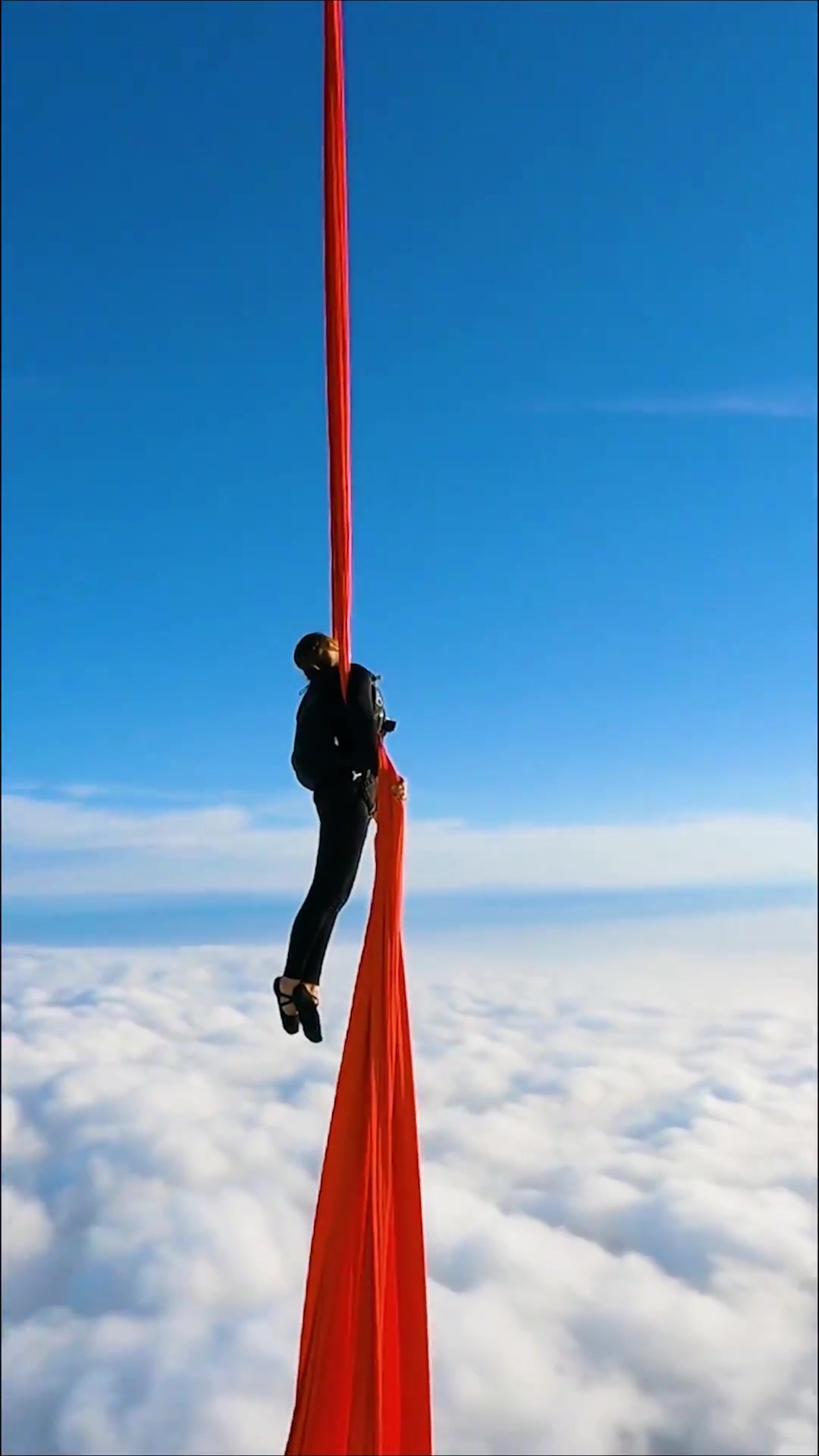 Aerial Silk Performances High Above the Clouds