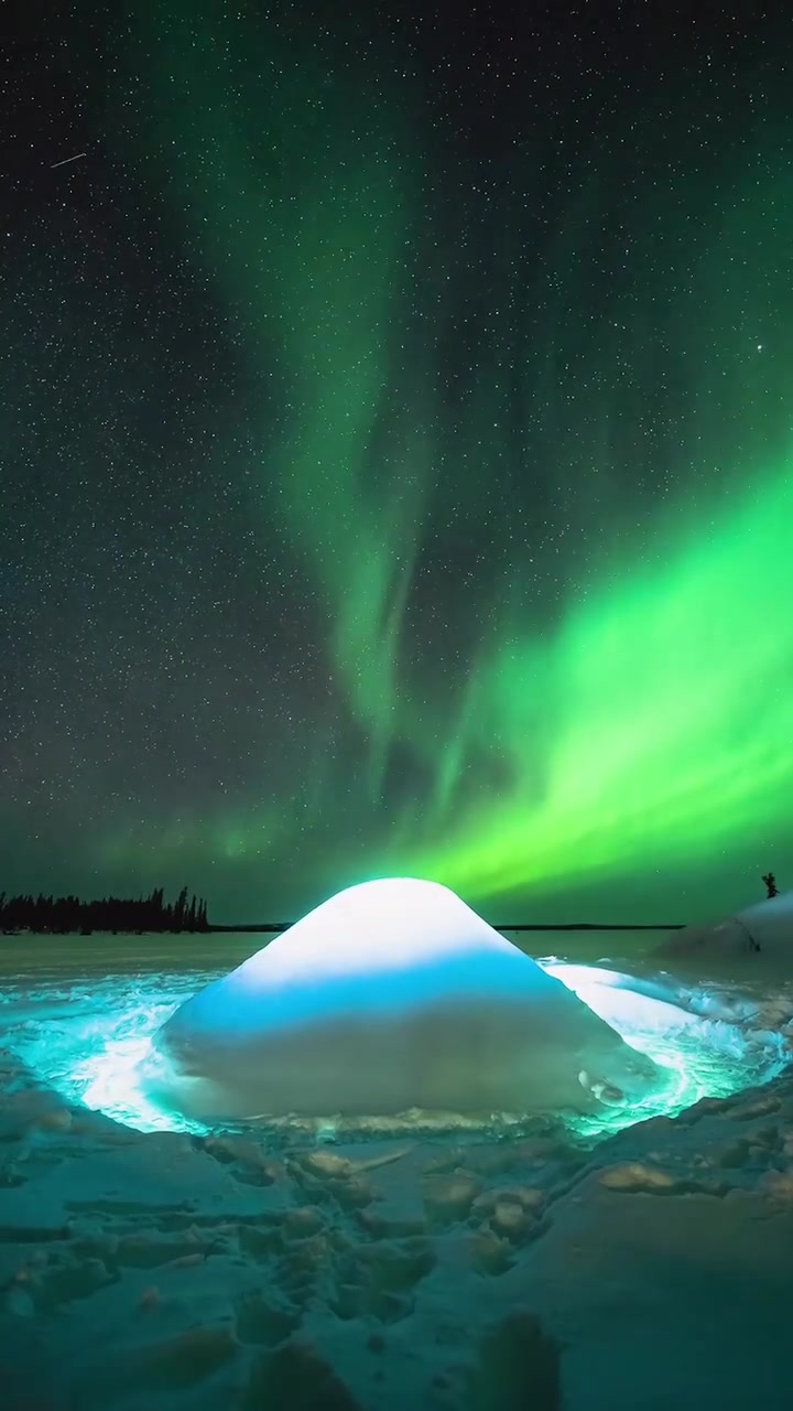 Aurora Borealis Over Canadian Snow Shelter