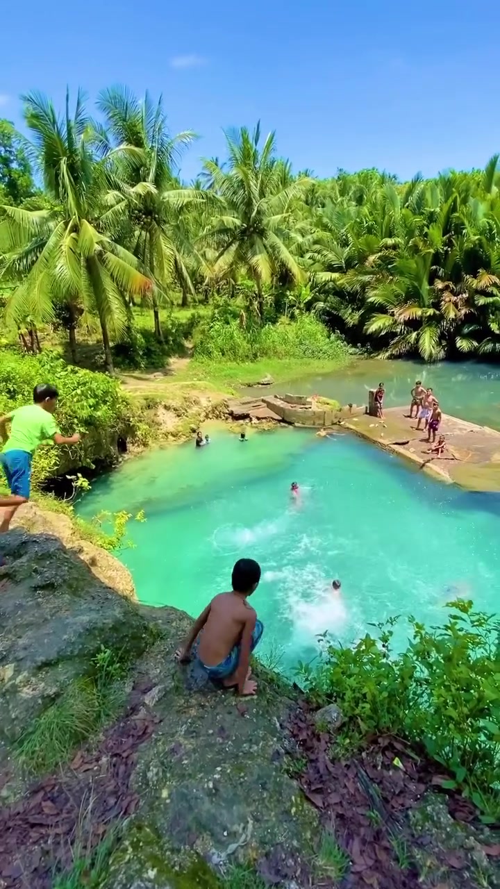 Tropical Swimming Hole: Joyful Scene in Nature
