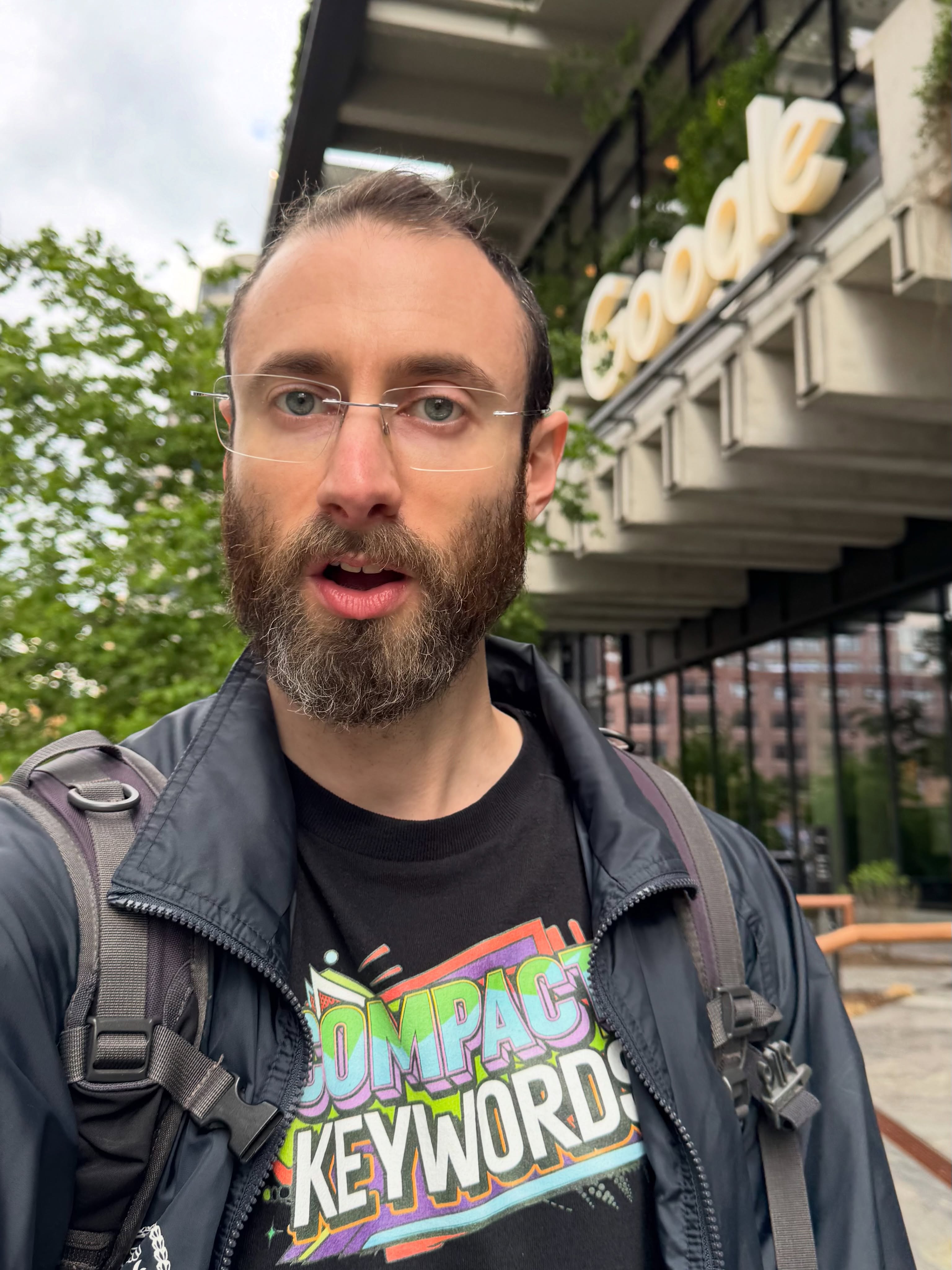 Man Taking Selfie at Google Building