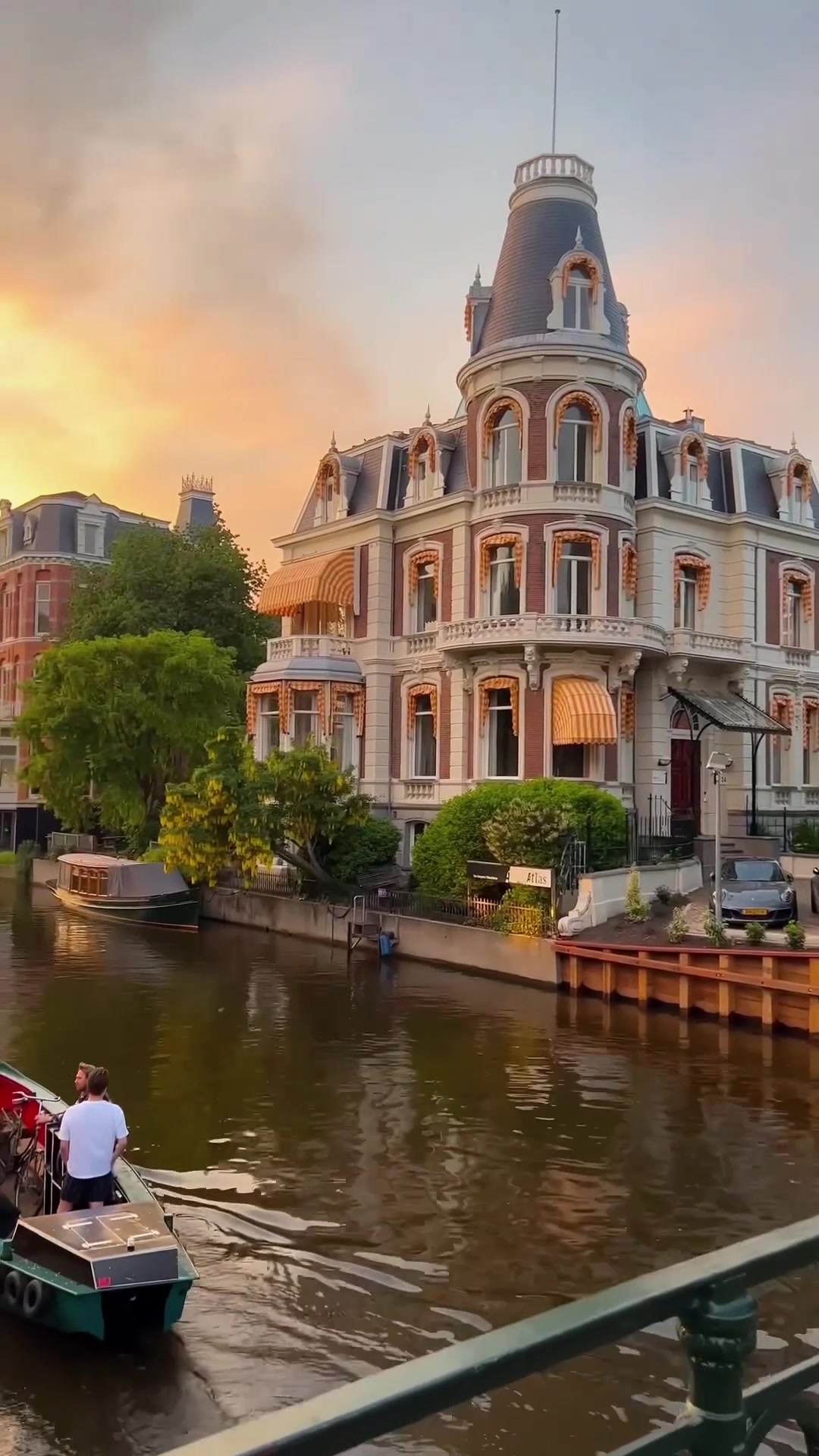 Canal View with Historic Building and Boat Ride