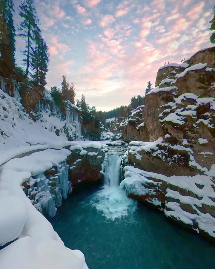 Winter Waterfall Landscape: Snowy Gorge at Sunrise