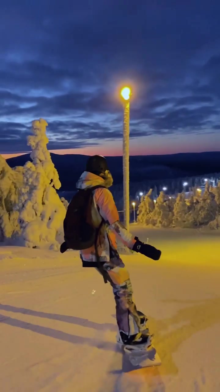 Snowboarding in Levi Finland at Dusk