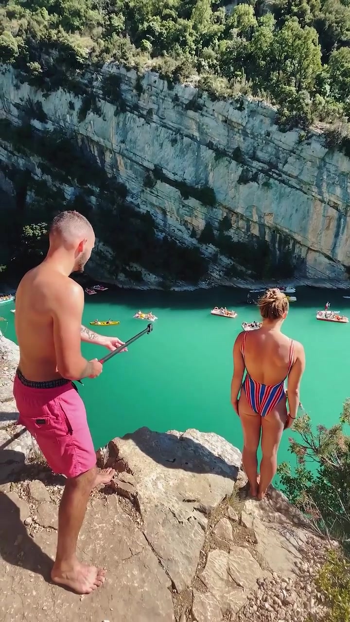Cliff Jumping into Turquoise Water: Adventure