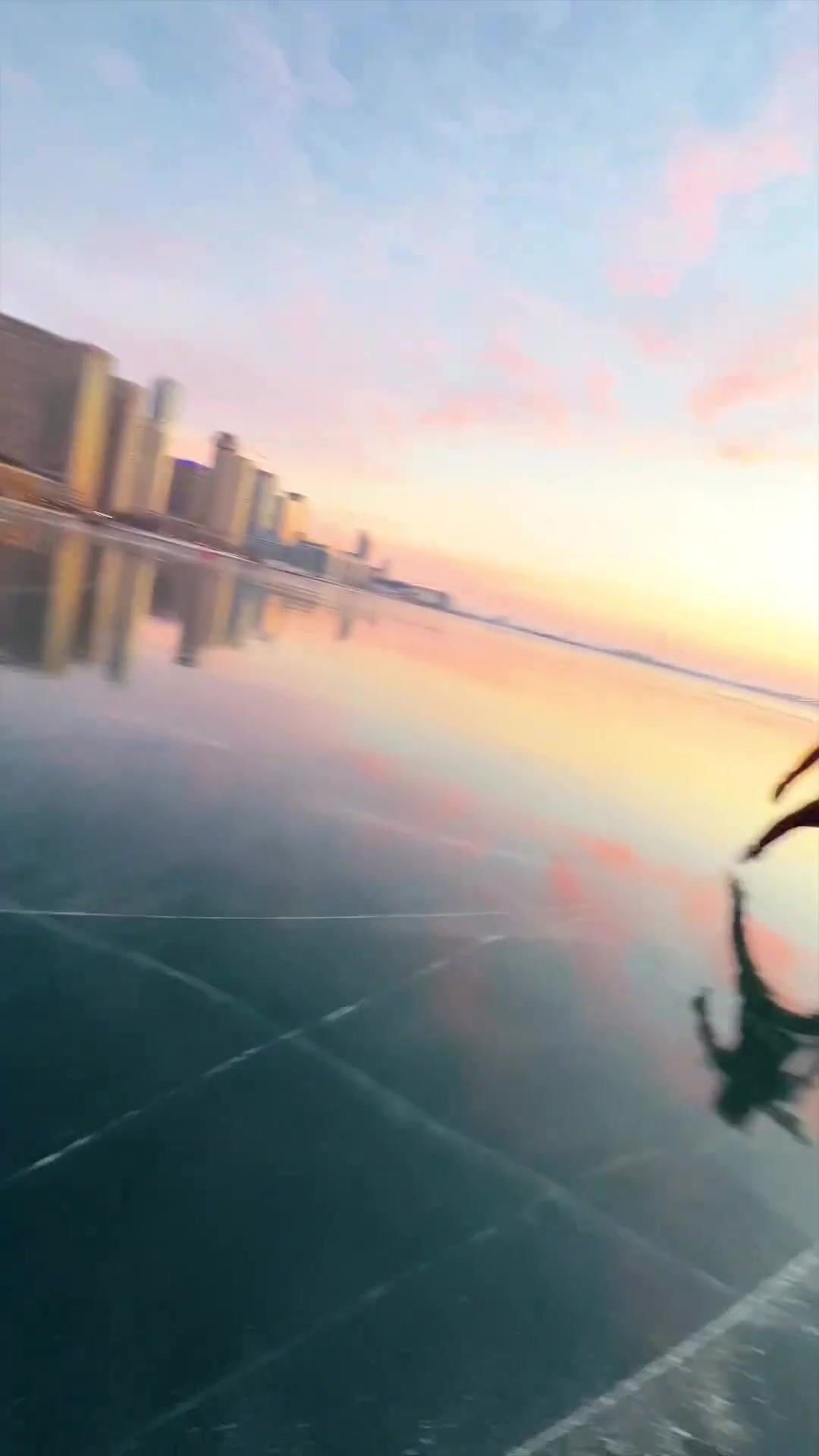 Roller Skating on Ice: Sunset Tricks and Cityscape