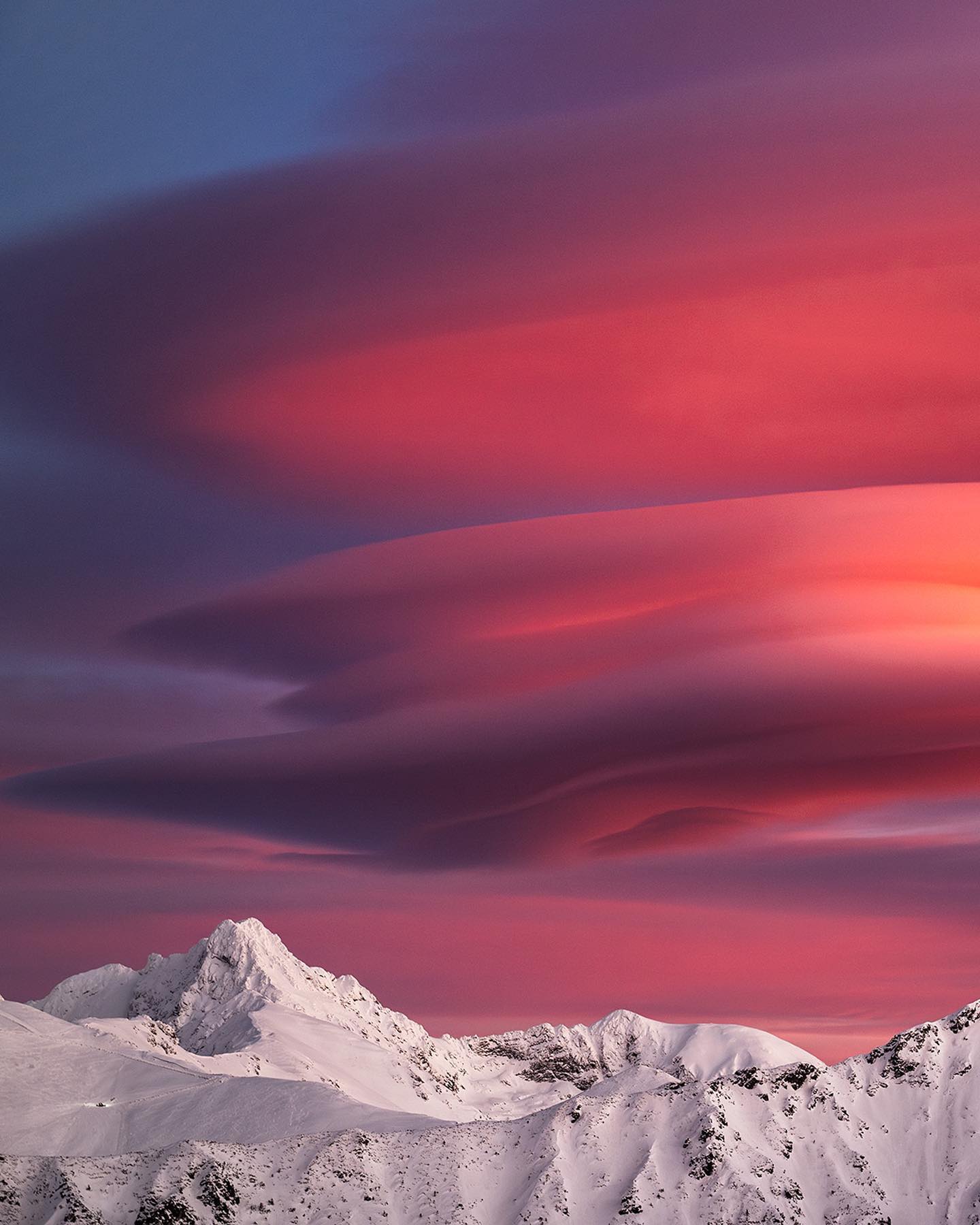 Mountain Sunset: Snow-Capped Range at Dusk
