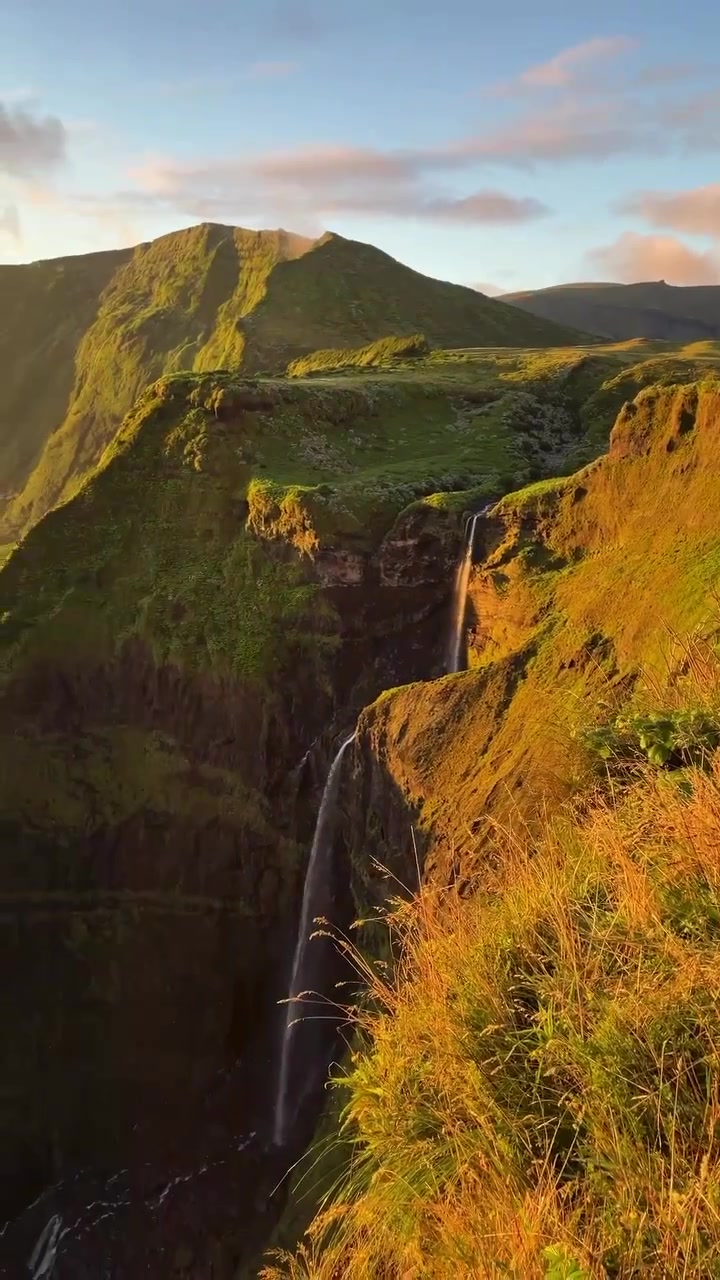 Aerial Views of Waterfalls in Lush Landscapes