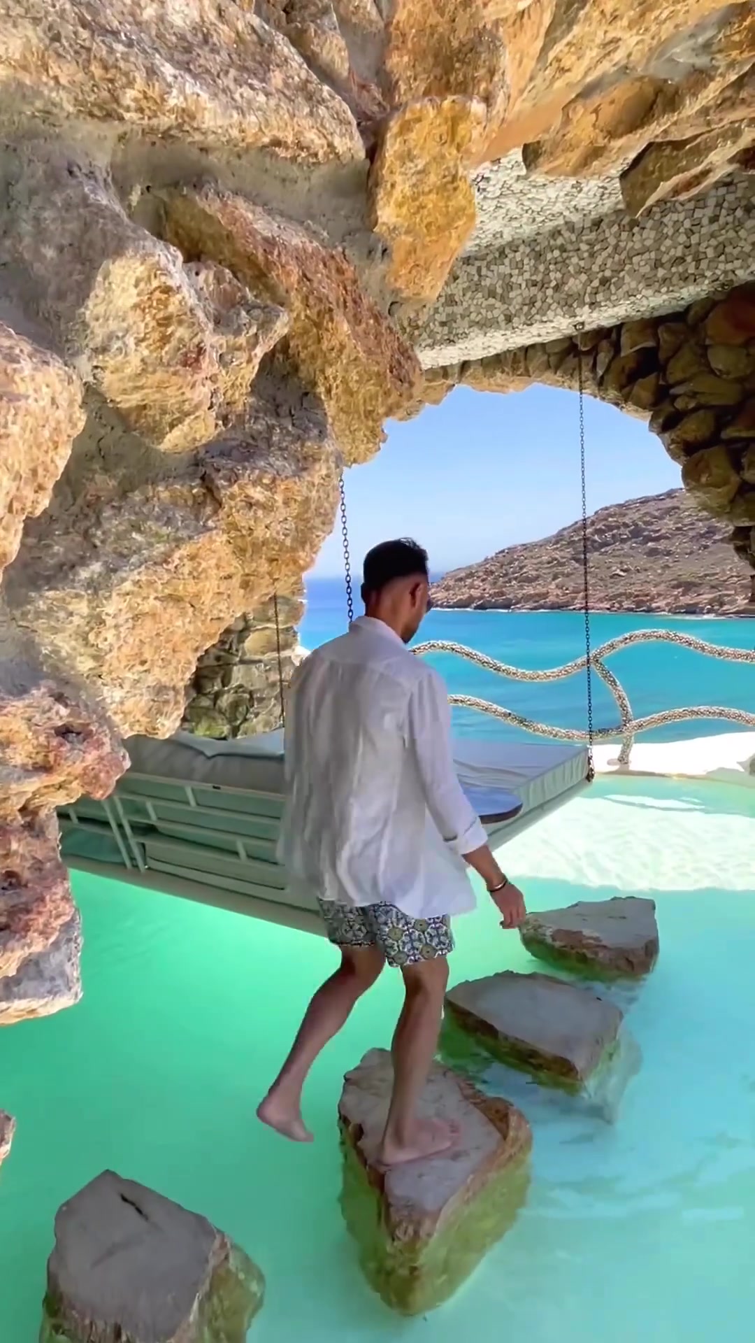 Luxury Pool Swing: Coastal Cave Retreat