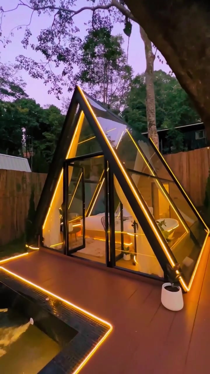Sunny Rung's Neon-Lit A-Frame Cabin in Chiang Mai