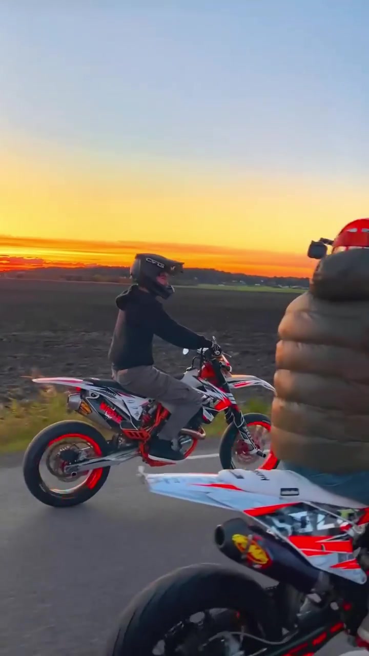 Dirt Bike Riding: Sunset Wheelie on Paved Road