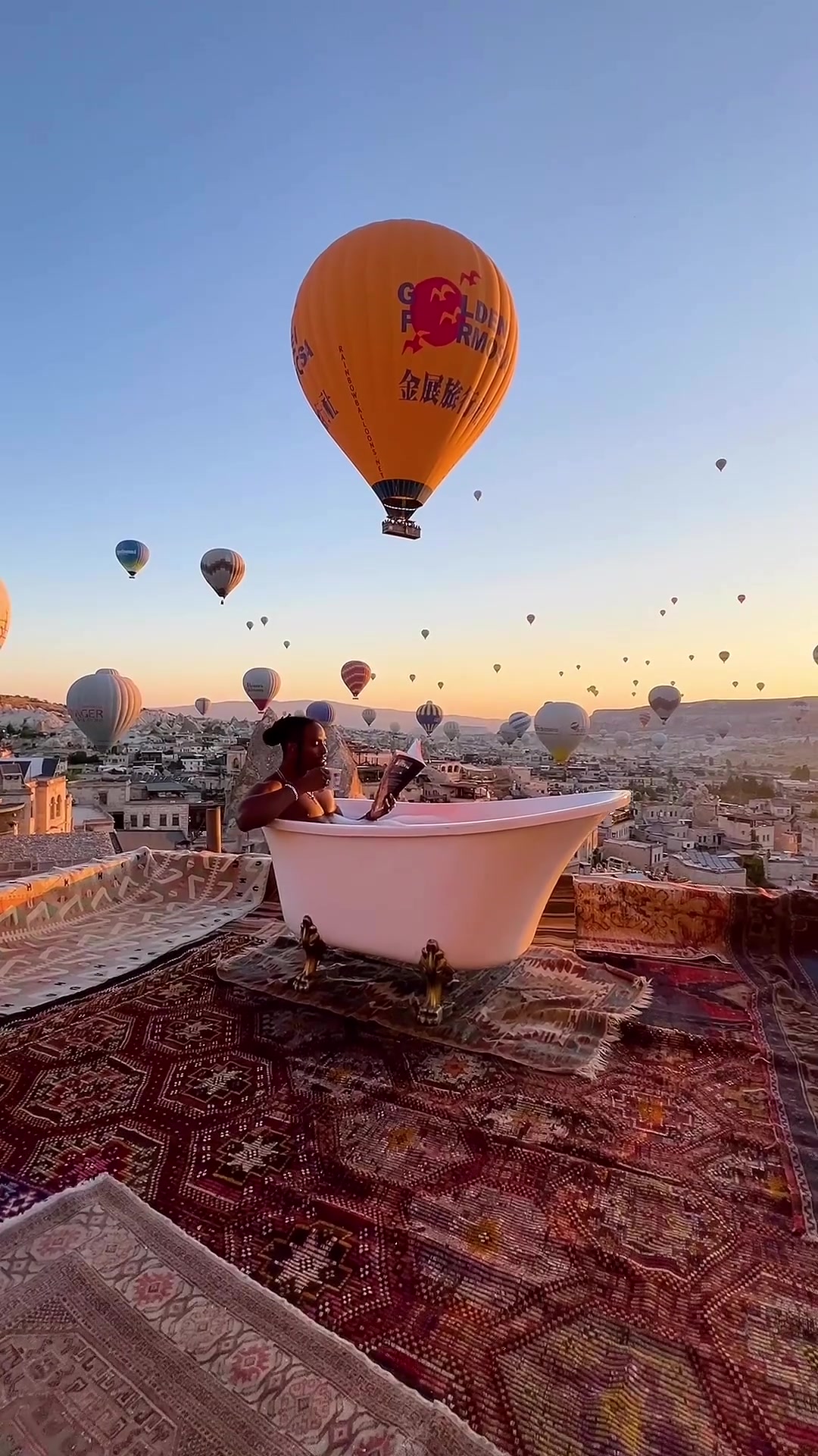 Rooftop Bathtub Relaxation With Hot Air Balloons