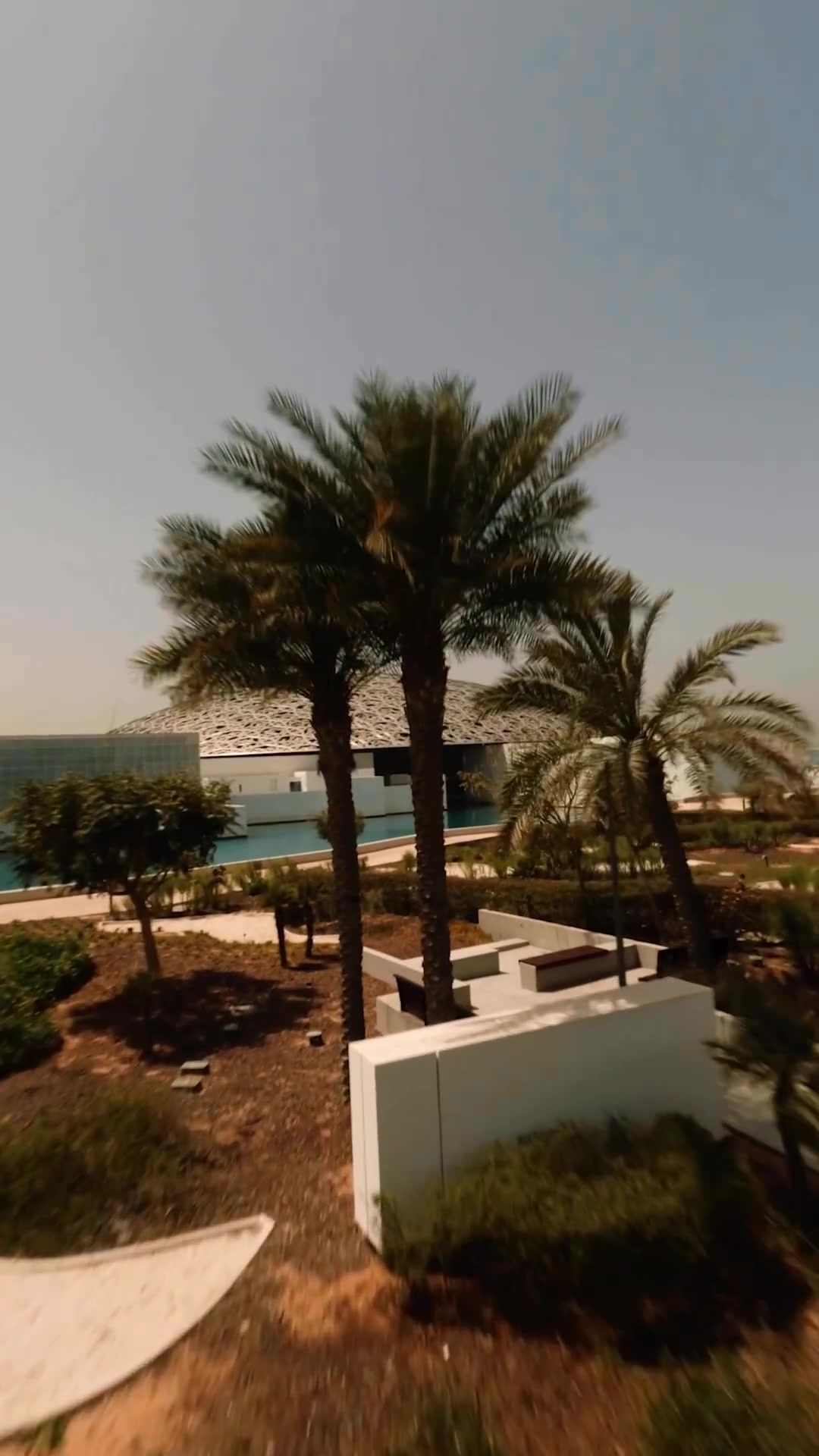 Louvre Abu Dhabi's Iconic Dome Design and Surroundings
