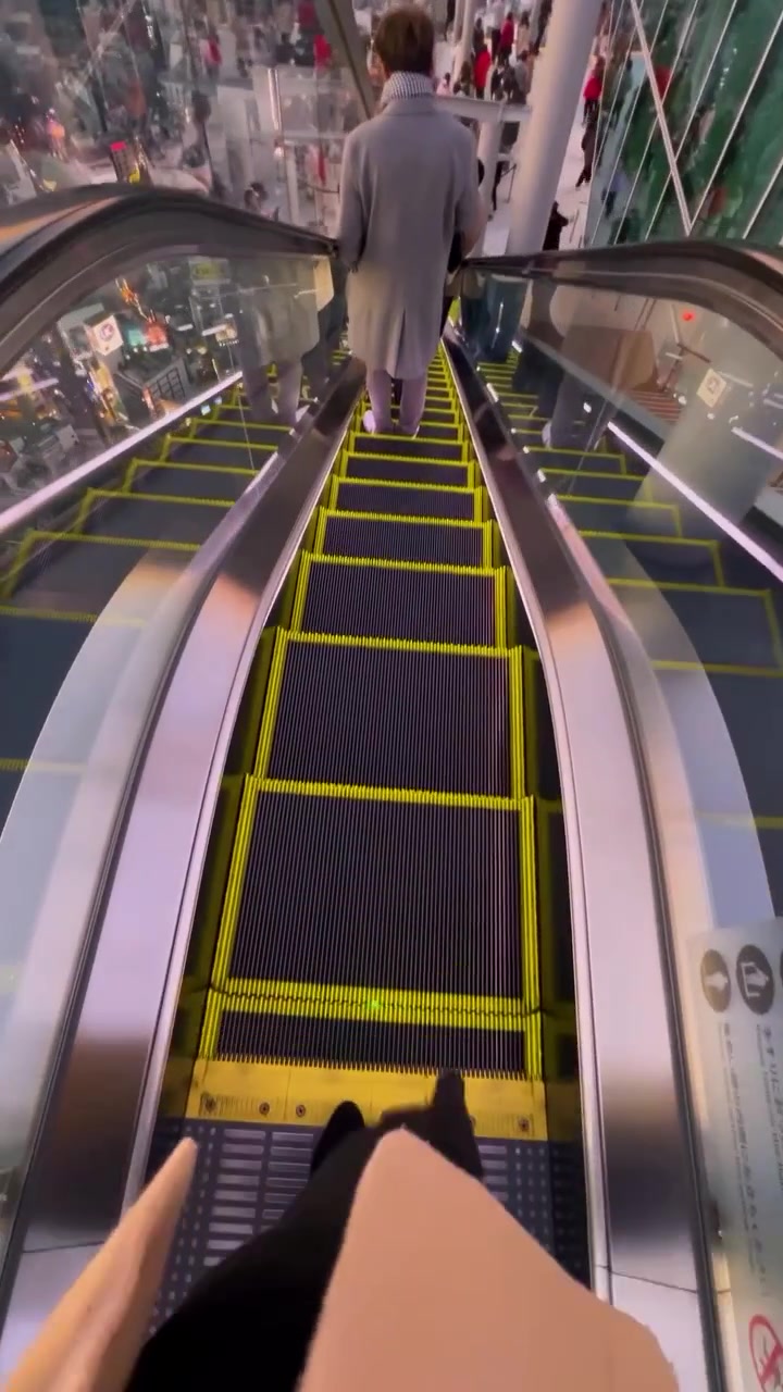 Escalator Ride: City View from Mall to Skyline