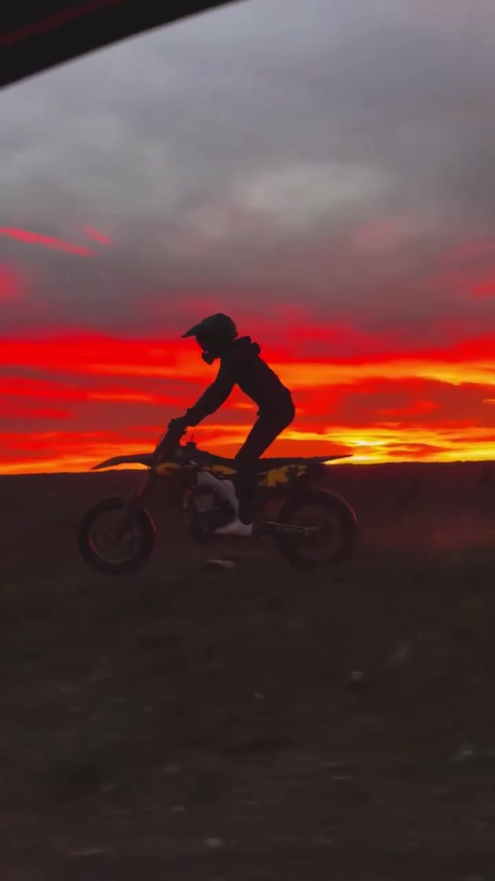 Dirt Bike Riding at Sunset: Off-Road Thrills