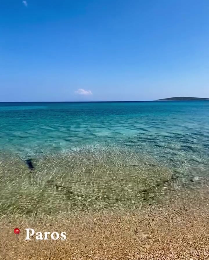 Paros Greece Beach Scenery: Turquoise Water and Sandy Shoreline