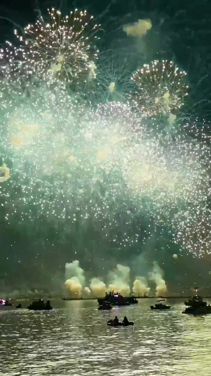 Fireworks Display Over Water: Vibrant Colors