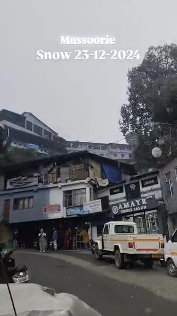 Mussoorie's Snowy Street Charm in December 2024
