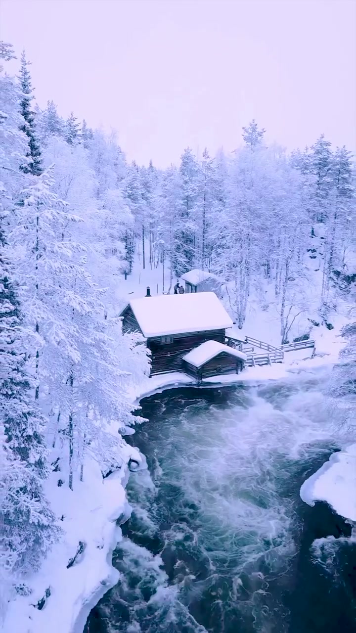 Winter Cabin Landscape: Aerial View of Snowy Scene