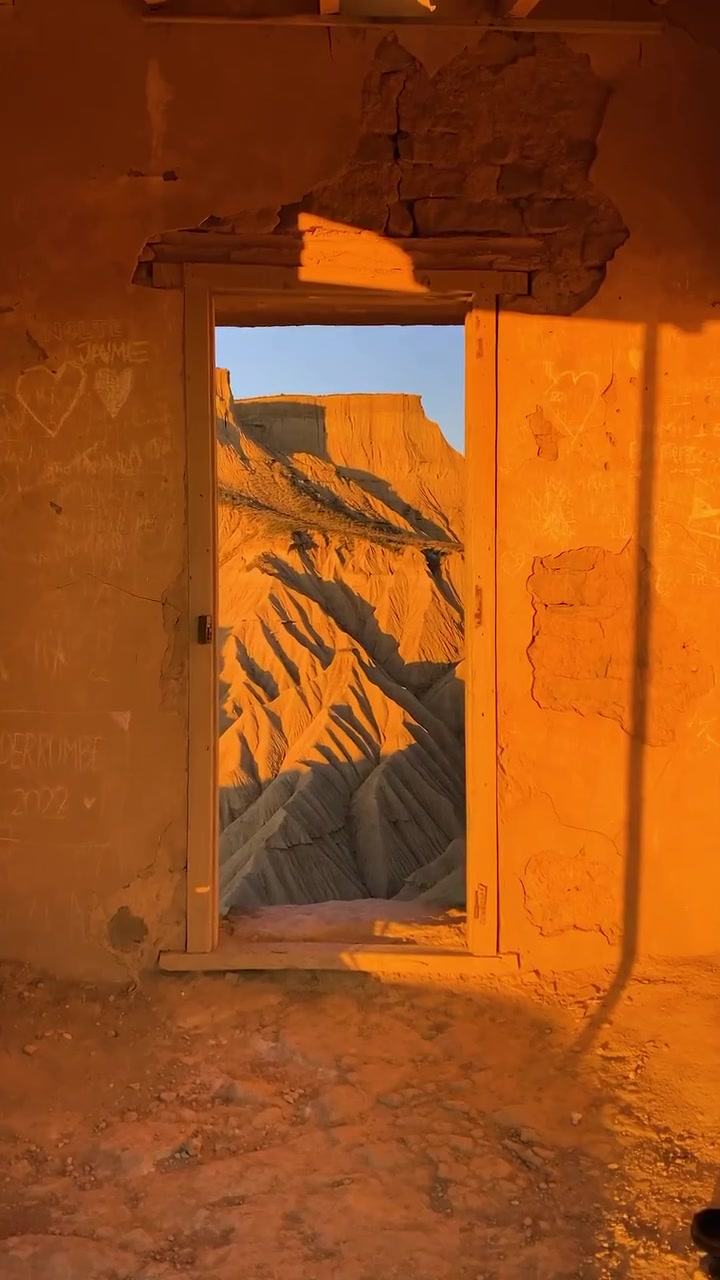 Desert Landscape View Framed by Weathered Doorway