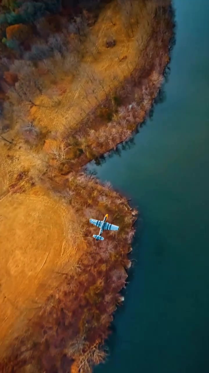 Airplane Landing Near Water: Aerial Footage
